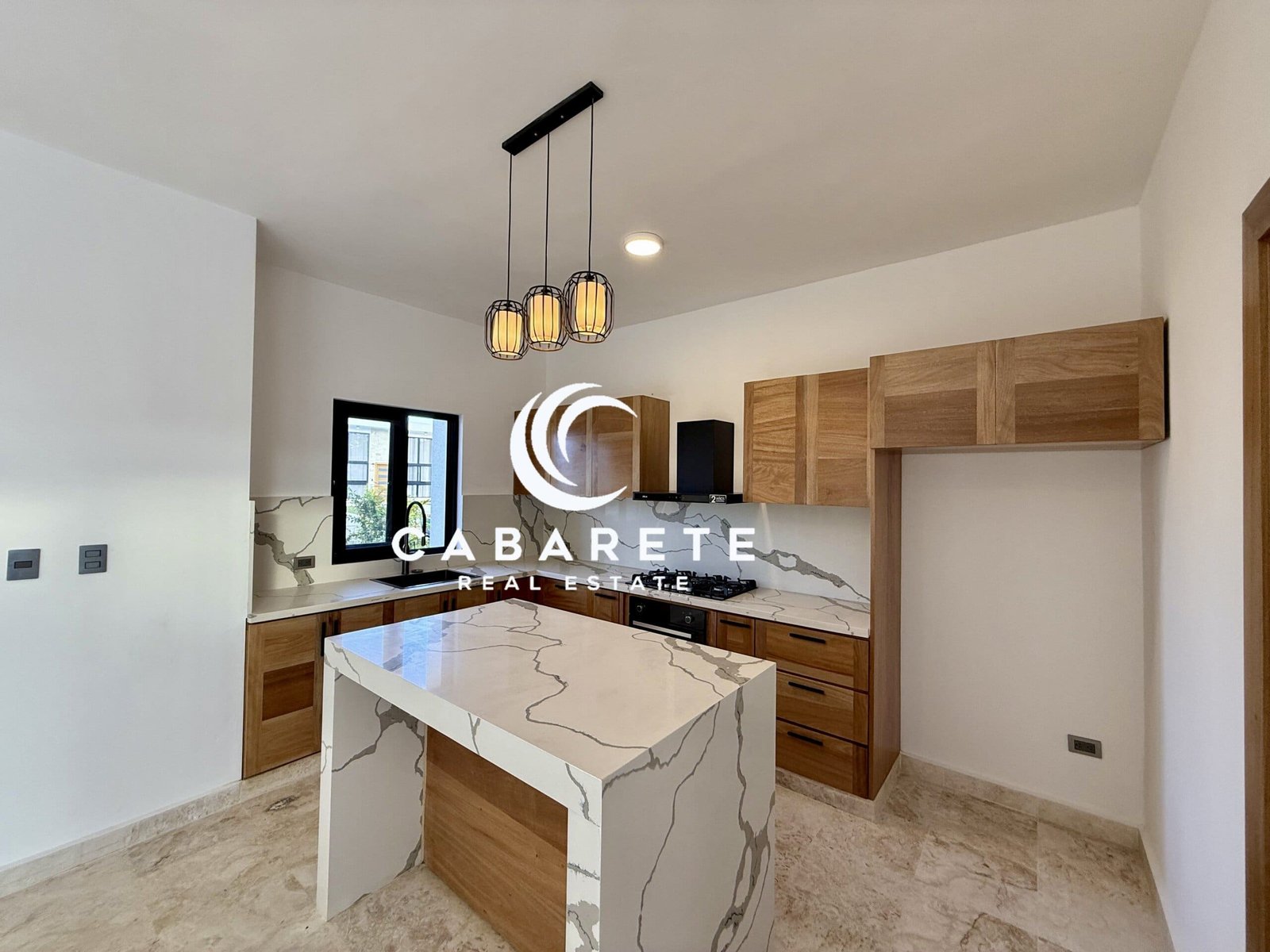 Modern 3-bedroom tropical villa featuring landscaped grounds and a sunny pool area