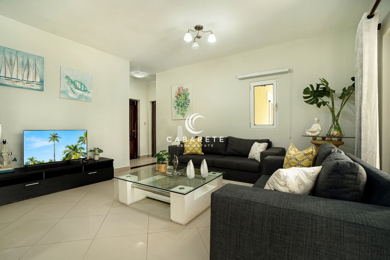 Living room of 2 bedroom garden condo in Pro Cab