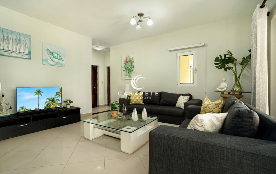 Living room of 2 bedroom garden condo in Pro Cab 1170x738